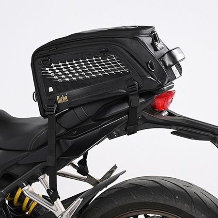 motorcycle seat bag with fastening strap system, easily and securely mounts to most of motorcycle seat or rack.